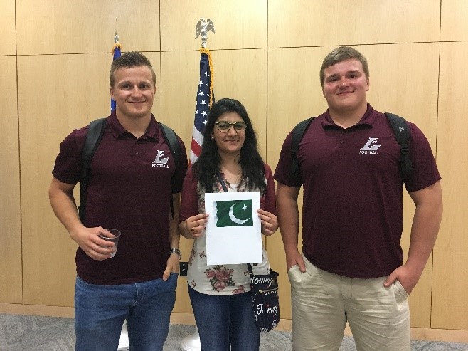 Pictured from left to right: Walter Vasanoja, Zubia Jamil from Pakistan, and Oliver Vasanoja 