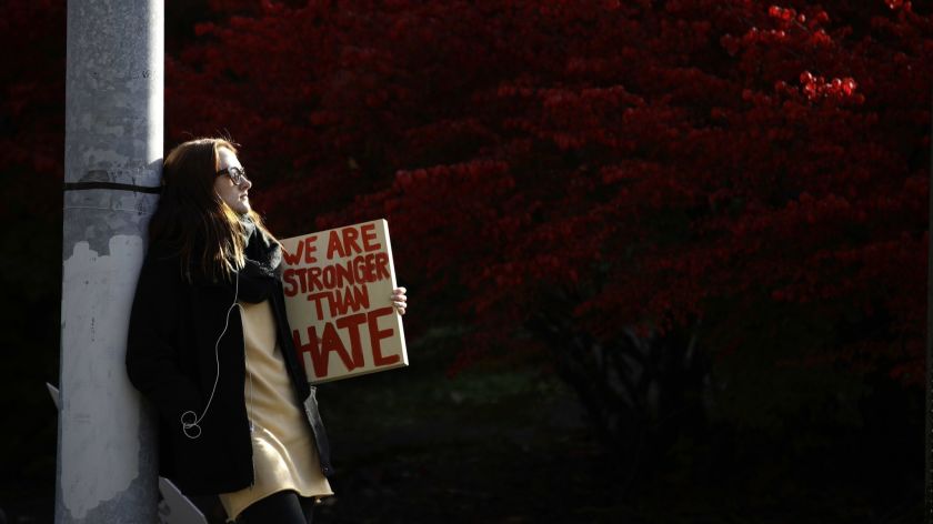 A demonstrator waits for the start of a protest in the aftermath of the mass shooting at Pittsburgh’s Tree of Life Synagogue late last month. Photo by Matt Rourke, AP News.