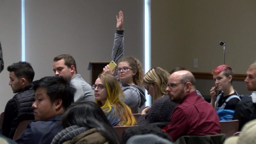 UWL Senior Alyson Young waits to ask a question to Chancellor Gow at his annual open forum. Photo retrived by WXOW.