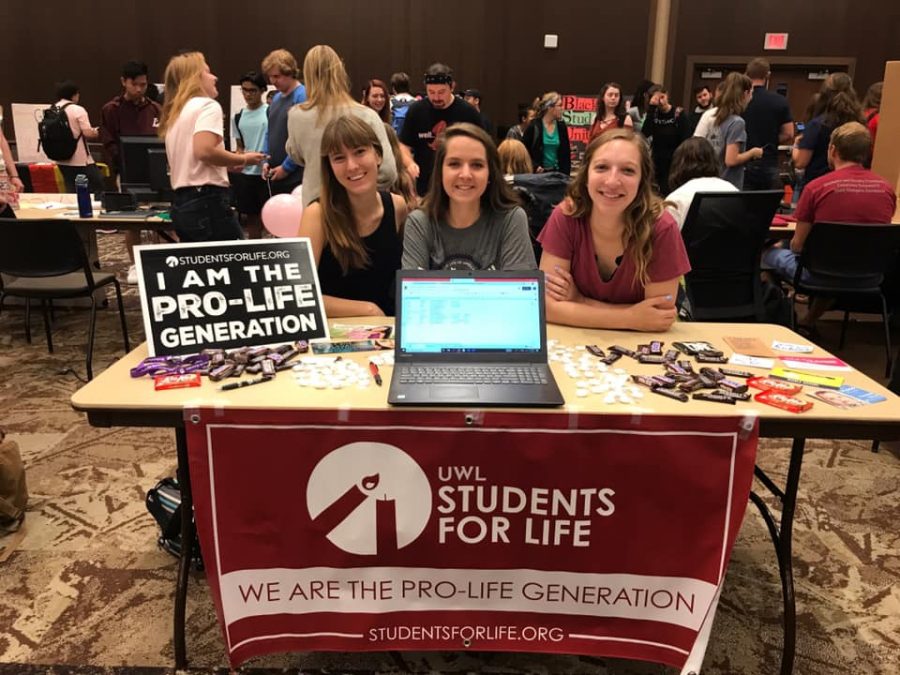 Julia Tutton, Katie Voet and Colleen Duffy represent Students for Life at UWLs Involvement Fest 2019.