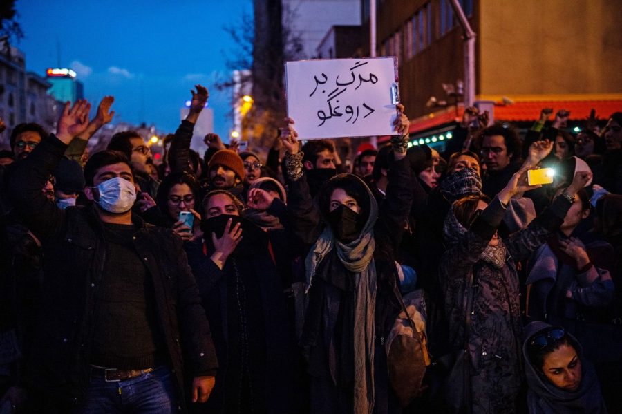 Protestors chant during a vigil for the victims of the Ukraine International Airlines flight Tehran. 