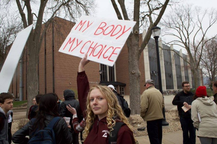 UWL+student+Emma+Hedding+protests+with+a+sign+reading+My+Body+My+Choice