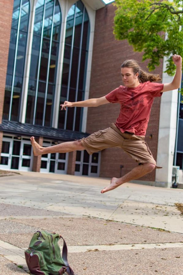 UWL student Gunnar Schwertfeger performs a martial arts move.