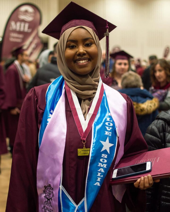 UWL student Marian Haile poses for a photo after graduation.