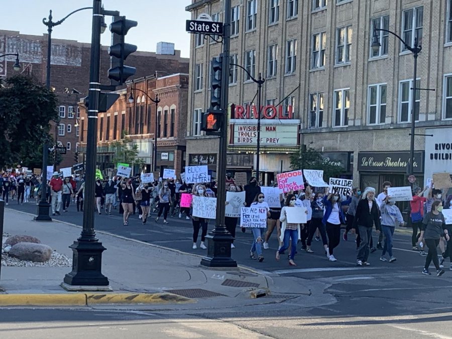 Demonstrators in front of Rivoli Theatre.