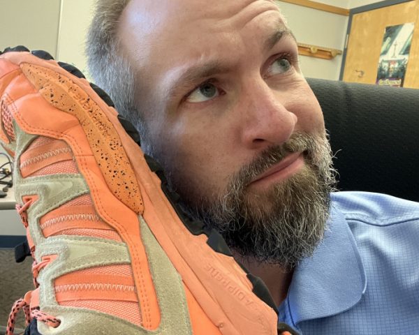 Brandon Meyer posing with his shoe. (Photo received from the Supreme Sneakerhead website.)