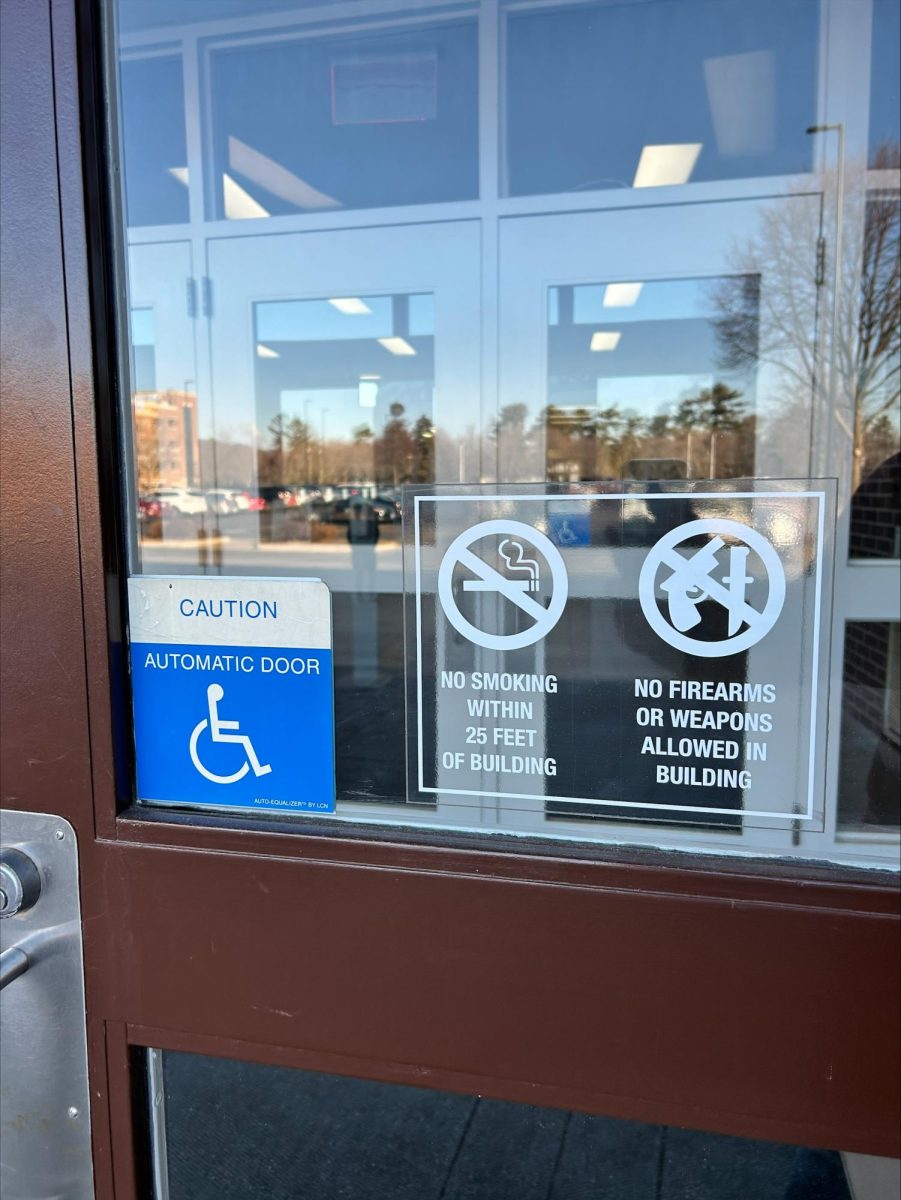 Signage prohibiting firearms outside of Eagle Recreational Center. Photo taken by Jackson Skarp. 