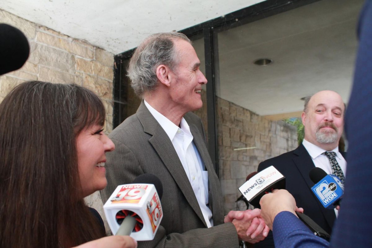 Joe Gow, Carmen Wilson and Mark Leitner outside of Van Hise Hall. (Photo taken by Isabel Piarulli.) 