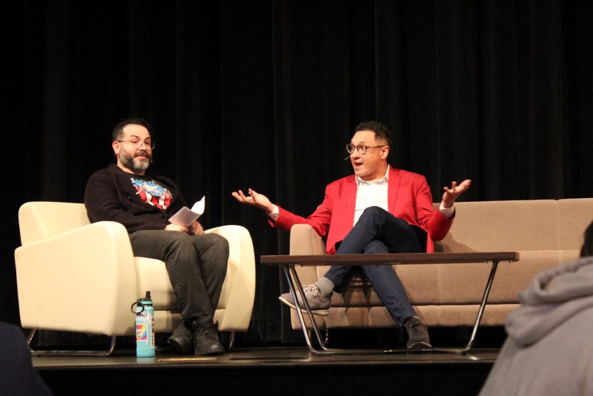 Caleb Colon-Rivera and J.C. Wagner-Romero talking on stage. Photo taken by Hephzibah Ohihoin. 