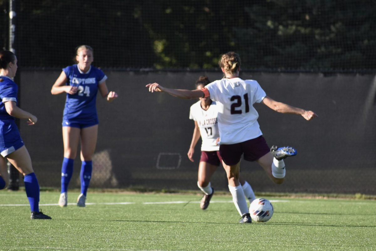 Sophie Pope making an attempt to score. Photo by Paige Geiser. 