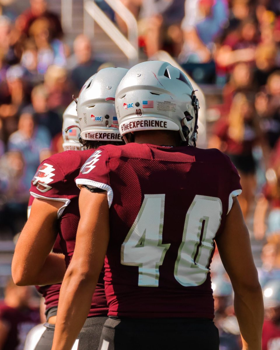 Austin Knade and the linebackers before a play.