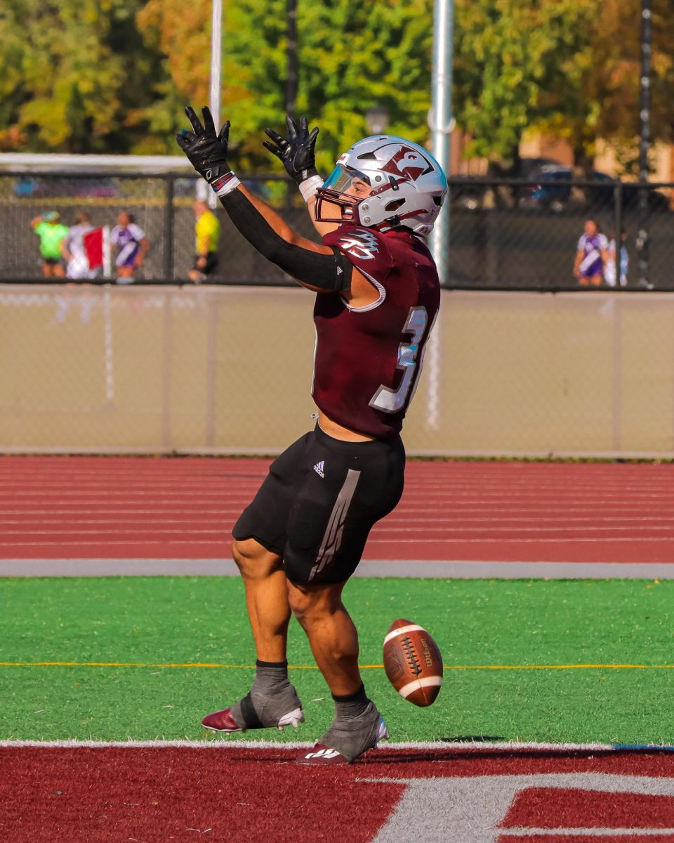 Gabe Lynch celebrates a touchdown.