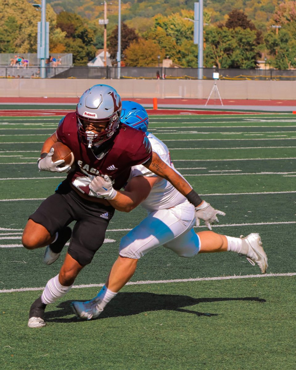 Braeden Ott breaks a tackle.