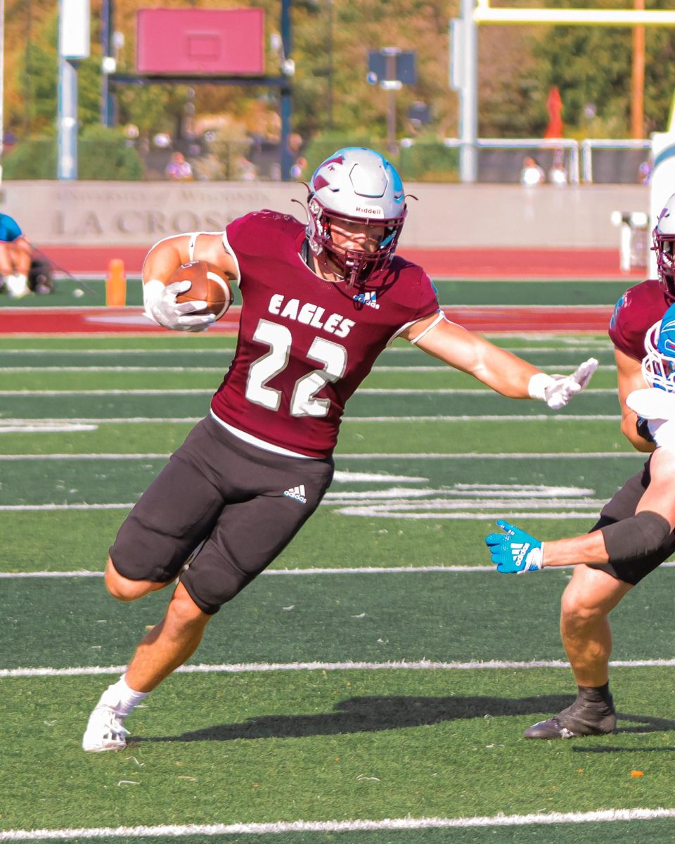 Braedon Ott running the ball. 