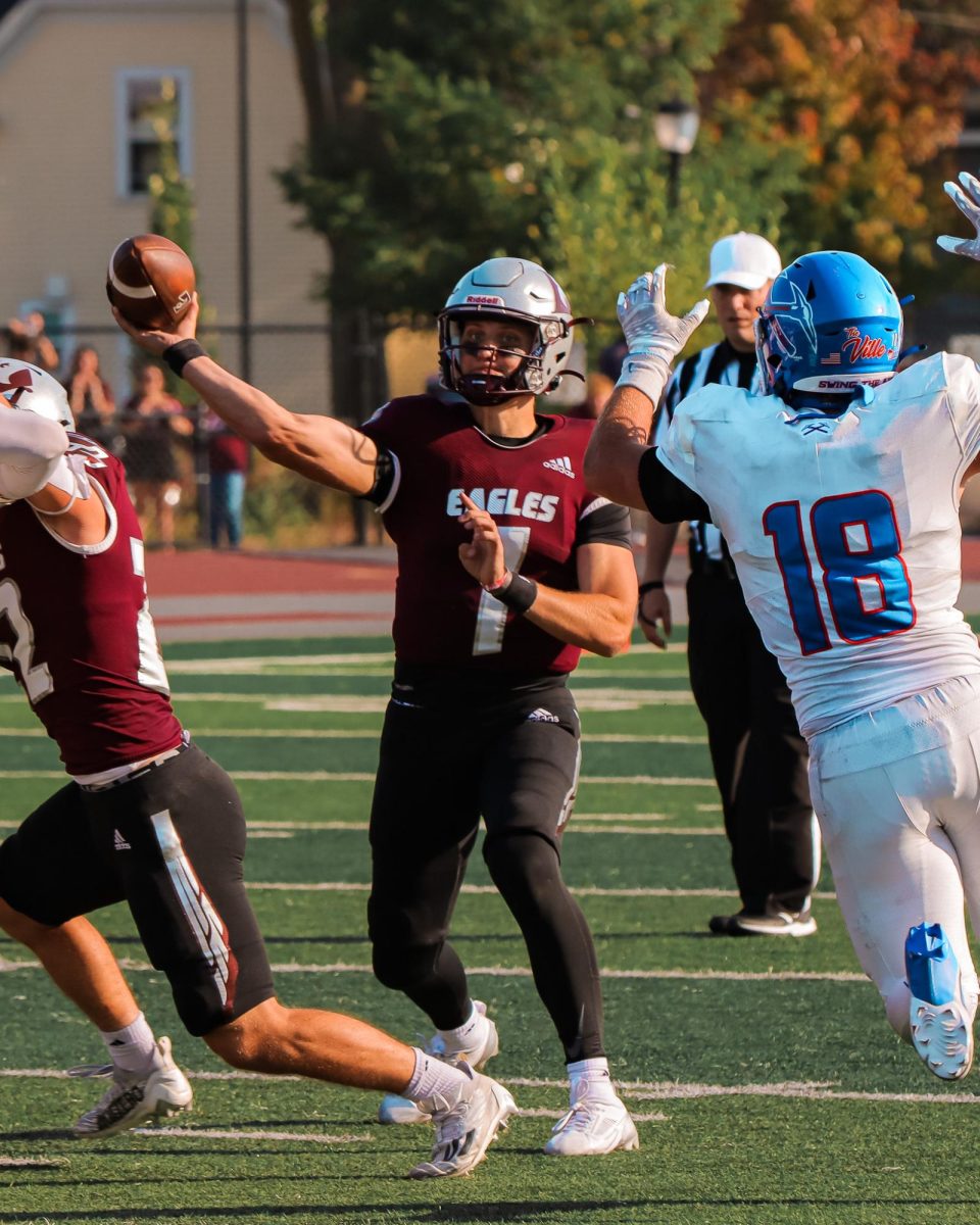 Zach Weir throws a pass.