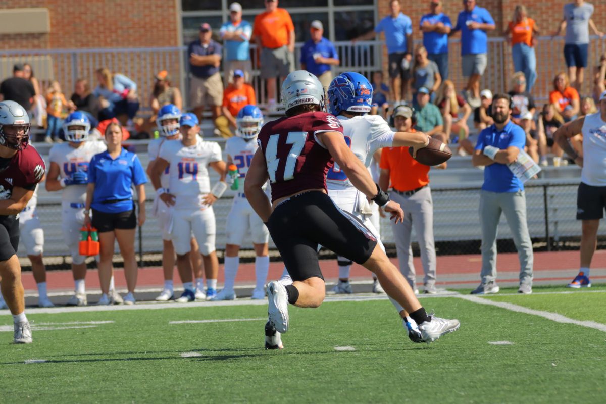 Henry Walsh attempts a sack.