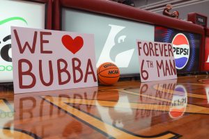 Signs honoring Charlie "Bubba" Lonning Weber. Photo taken by John Gaynor.