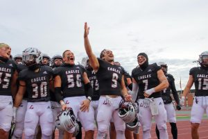 UWL Football players sing to the crowd after an NCAA DIII Championship game against University of Minnesota Northwestern.