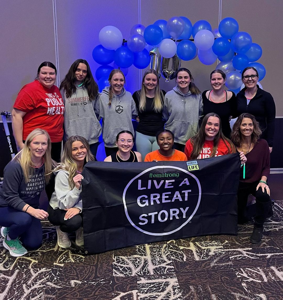 Eta Sigma Gamma members posing with the #emstrong banner (Photo retrieved from Eta Sigma Gamma.)