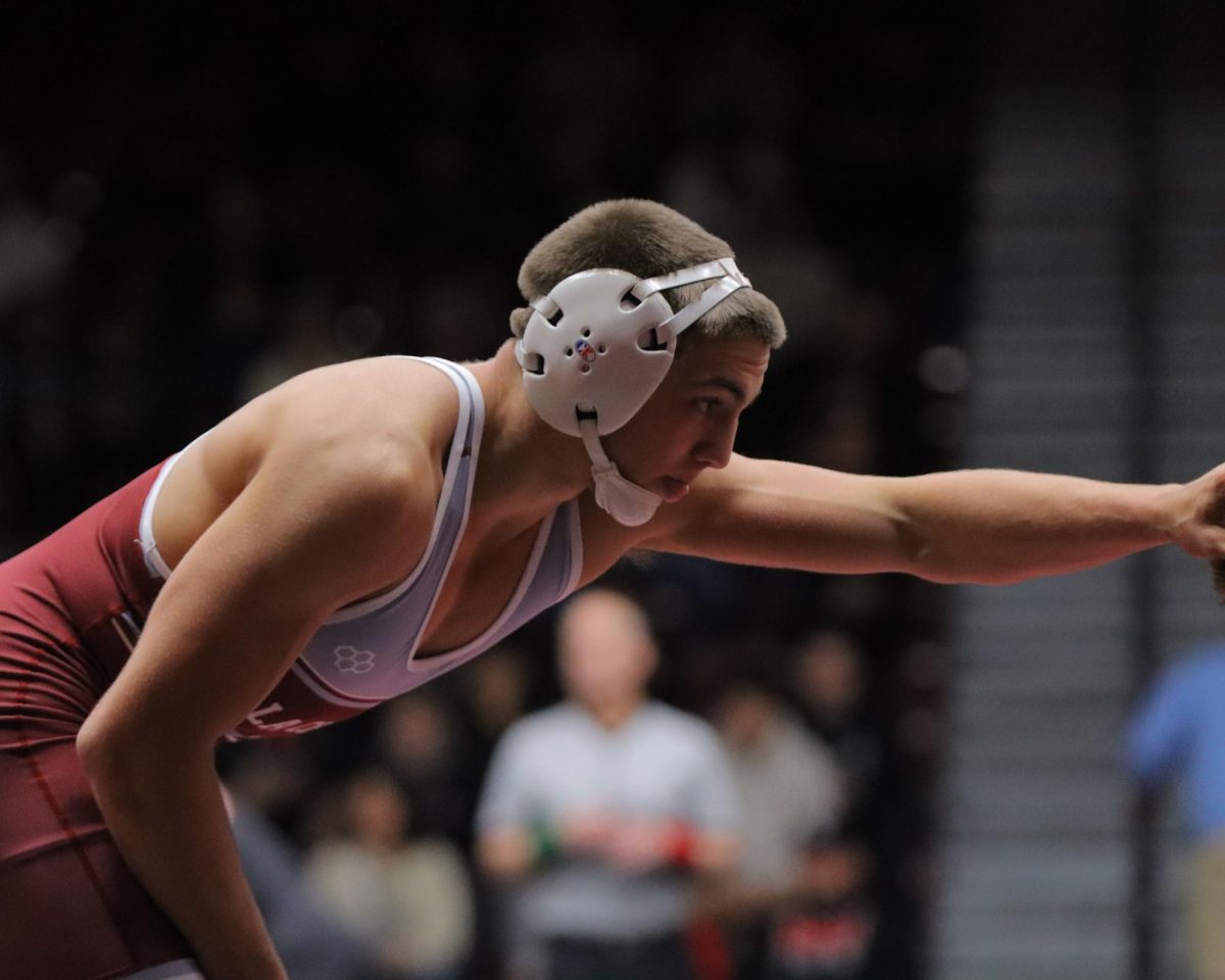 Tanner Gerber reaches out for his opponent.