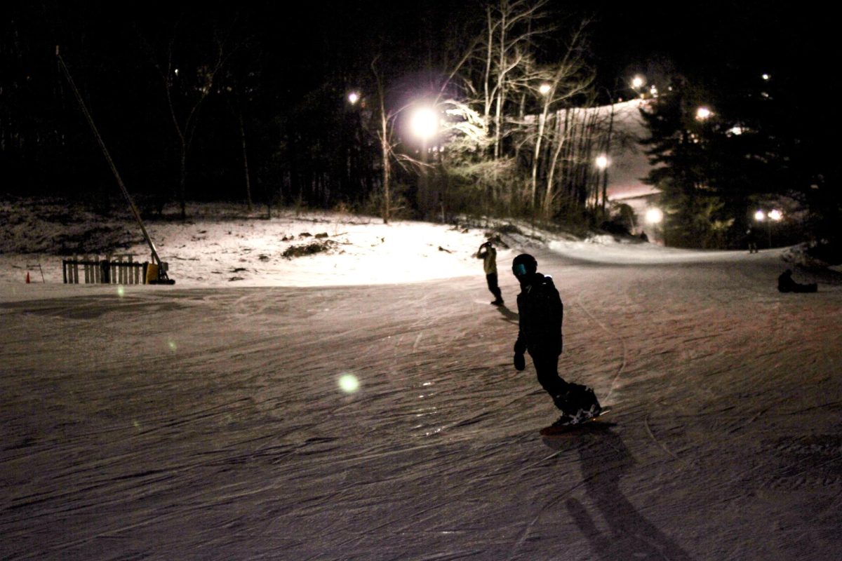 Snowboarders on the hill. Photo by Trinity Rietmann. 