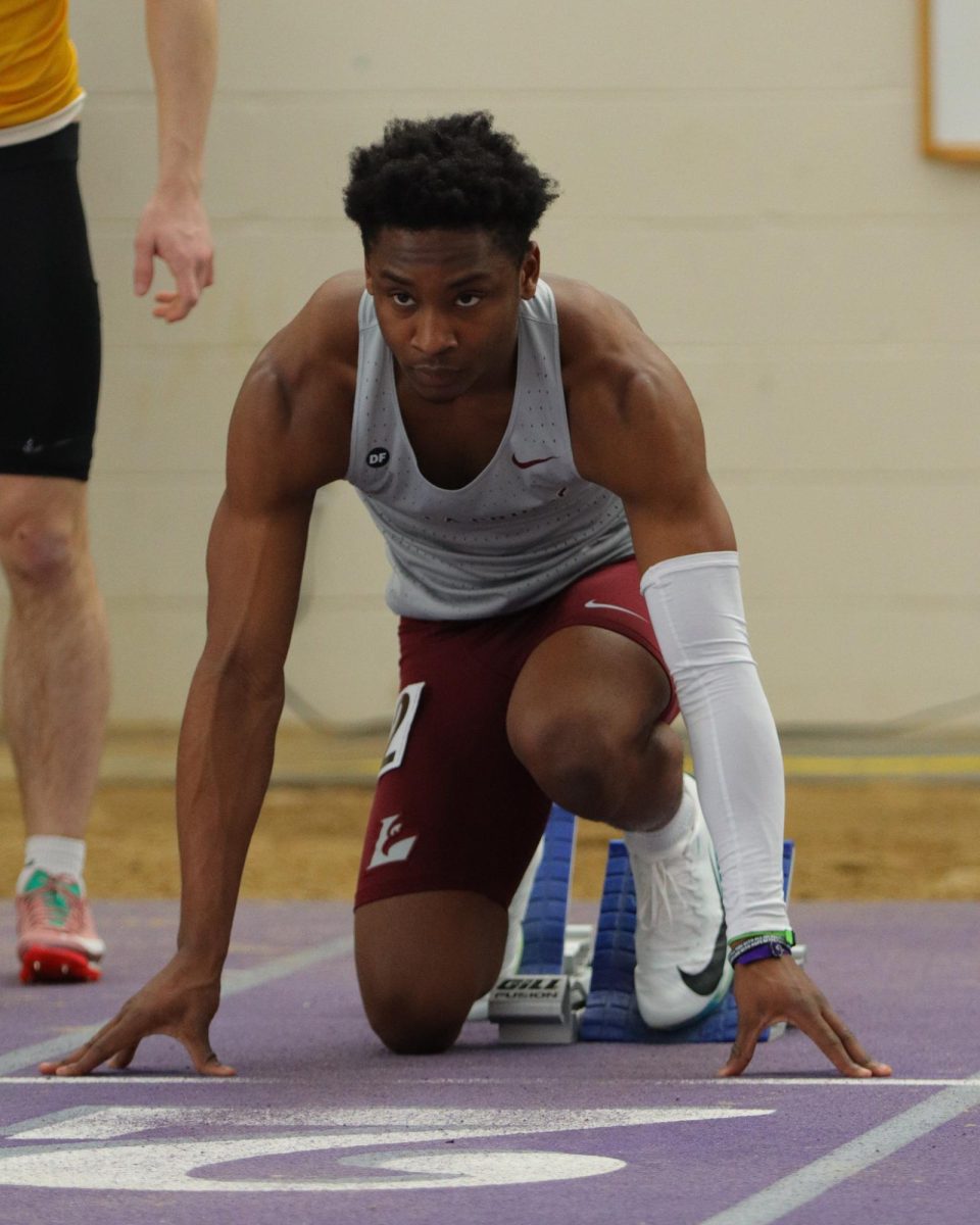 Lyndon Hemmrich-Hartman lines up for the men's 60-meter during the UW-Whitewater Midwest Elite Invitational on Saturday, February 15. Photo by John Gaynor. 