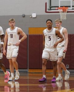 The Eagles return from a timeout during a game against UW-Eau Claire on Wednesday, Feb. 26 2025. Photo taken by John Gaynor.