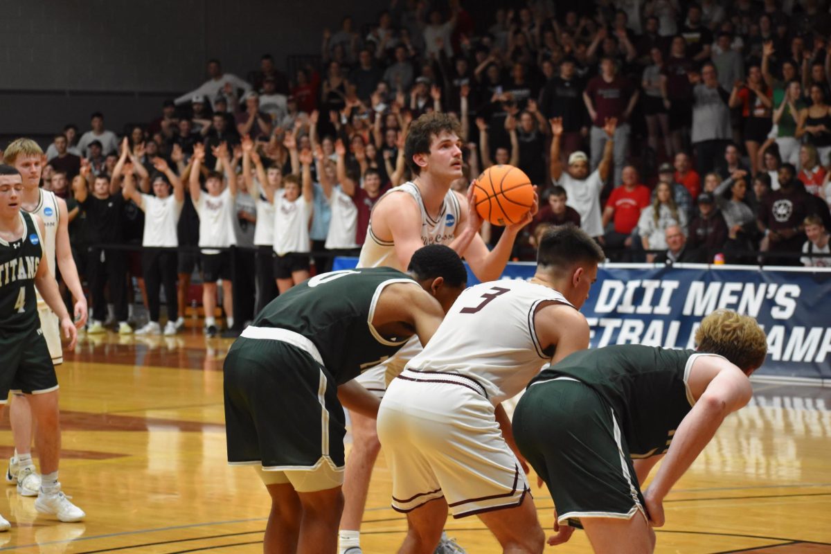 JJ Paider shooting a free throw. Photo by Paige Geiser. 