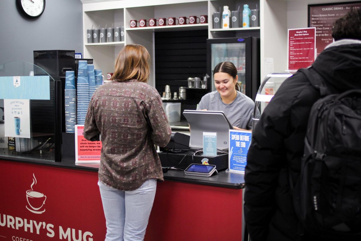UWL student working at Murphy's Mug. Photo by Trinity Rietmann. 