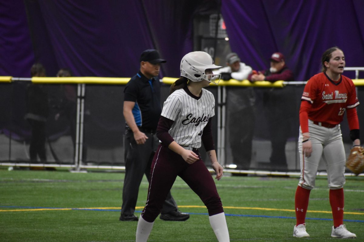 Eagles player watching the pitch from second base. Photo by Ava Grant.