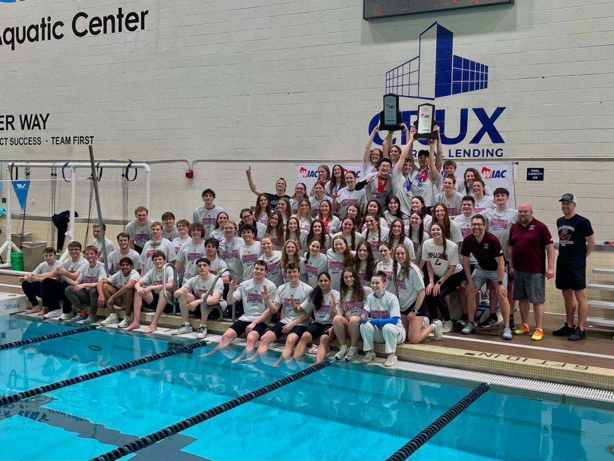 UWL men's and women's swim and dive teams with their WIAC Championships. Photo retrieved from UWL swim and dive. 